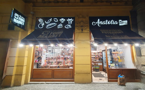 Anatolia Meat Market shopfront in central Prague at night
